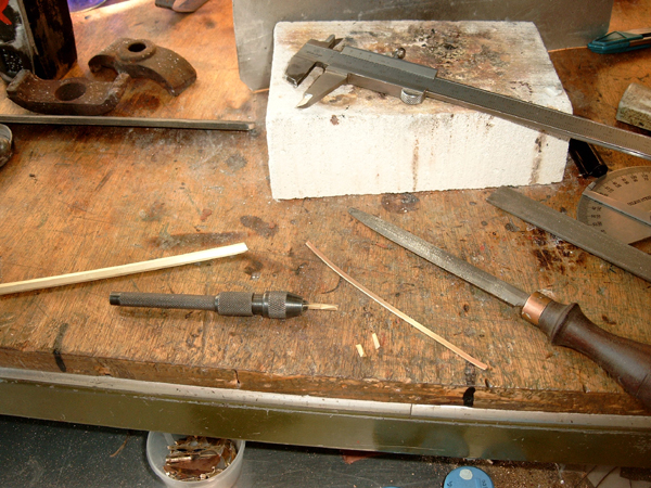 1) We nemen een vierkant staafje goud