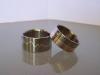 Titanium trouwringen ingelegd met fijnzilver en rosgoud en diamant