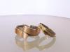 Rosgouden trouwring met titanium binnenband en geelgouden trouwring met titanium binnenband en diamant