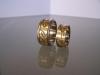 Geelgouden trouwringen met ingezaagd patroon met diamant en titanium binnenbanden