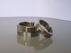 Gekantelde titanium duo ringen met diamant
