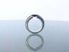 Titanium spanring met blauwe saffier