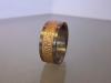 Ring met titanium en rosgoud en losse structuur